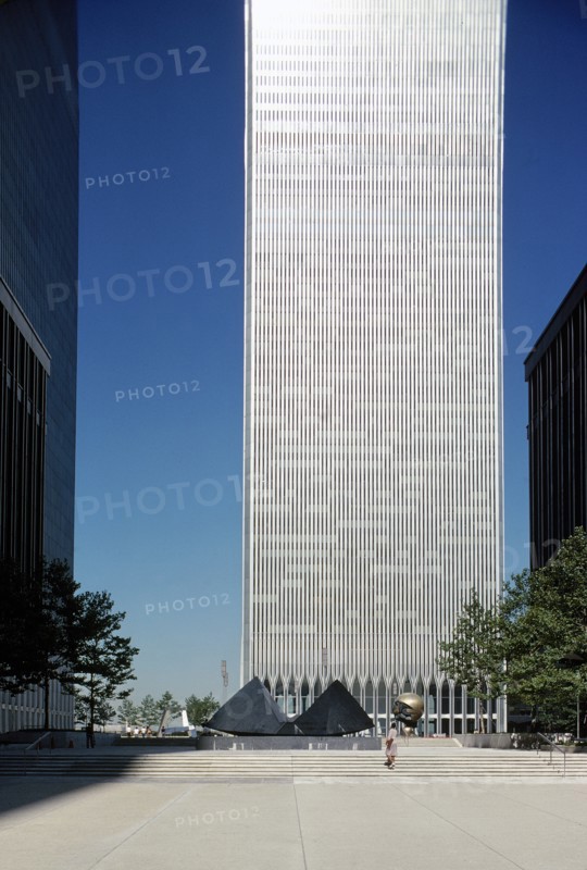 World Trade Center with Cloud Fortress sculpture by Masayuki Nagare and Sphere sculpture by Fritz Koenig at Plaza Fountain