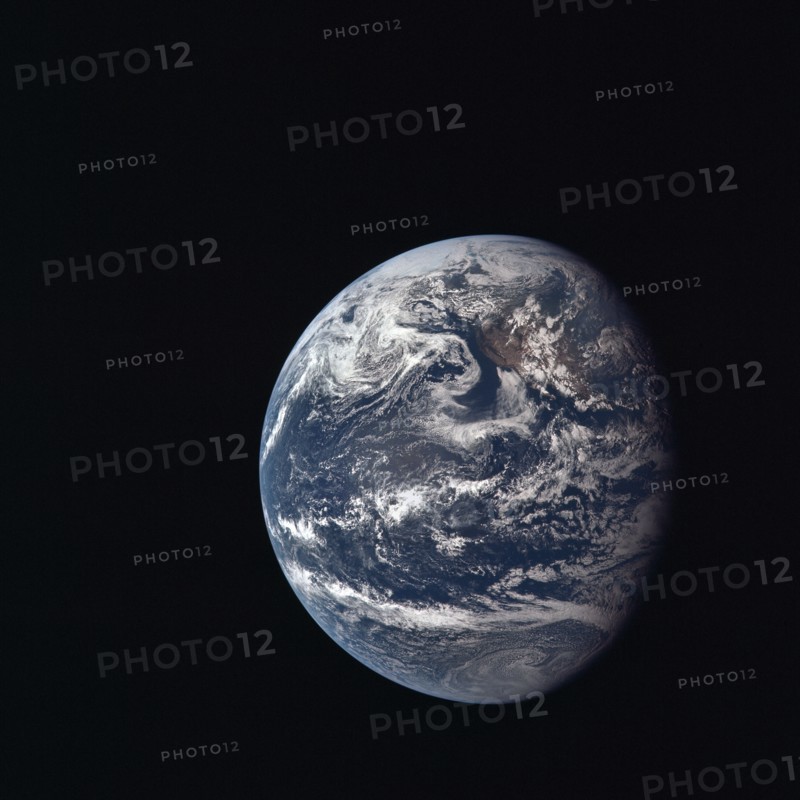 View of Earth taken by Apollo 11 crewmember during its trans-lunar coast toward the moon