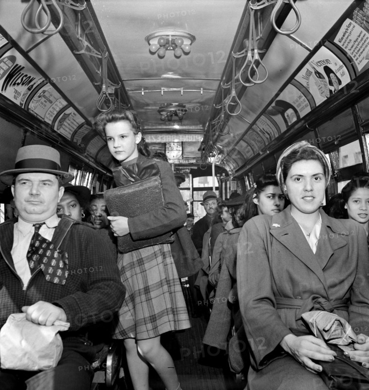 School children and workers returning home on a trolley at five p.m., Baltimore, Maryland, USA, Marjory Collins, U.S. Office of War Information, April 1943