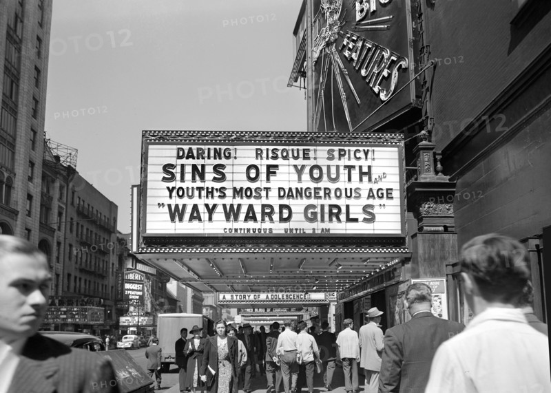 Street scene and risque movie marquee, 42nd Street, New York City, New York, USA, Marjory Collins, U.S. Office of War Information