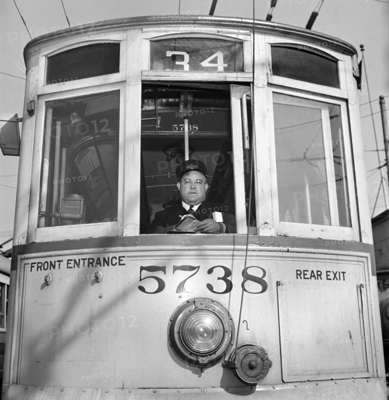 1917 vintage trolley, reconditioned because of wartime transportation pressure, and motorman, Baltimore, Maryland, USA, Marjory Collins, U.S. Office of War Information, April 1943
