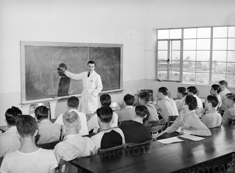 Instructor and students in class at vocational school for aircraft construction workers, San Diego, California, USA, Russell Lee, U.S. Farm Security Administration, May 1941