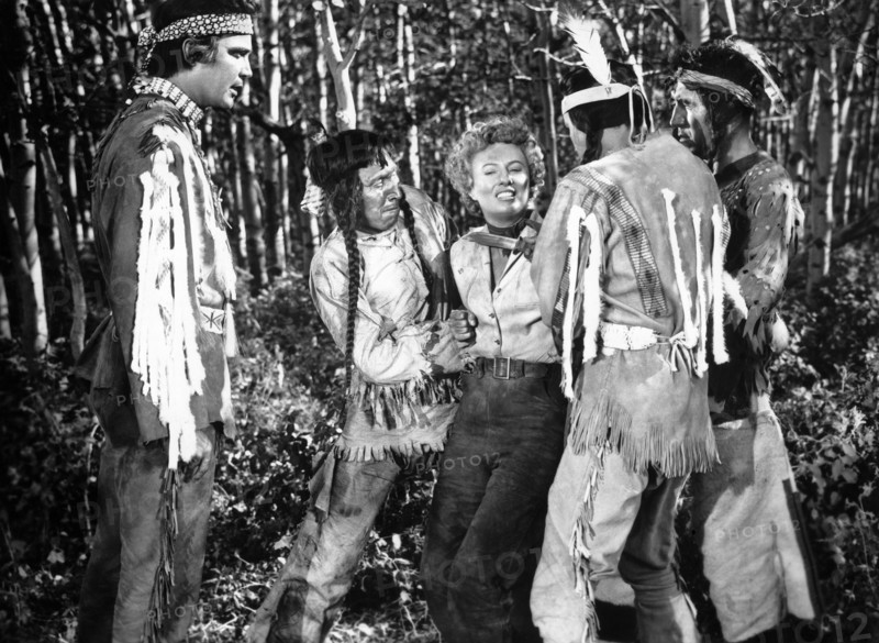 Lance Fuller (left), Barbara Stanwyck, on-set of the film, "Cattle Queen of Montana", RKO Radio Pictures, 1954