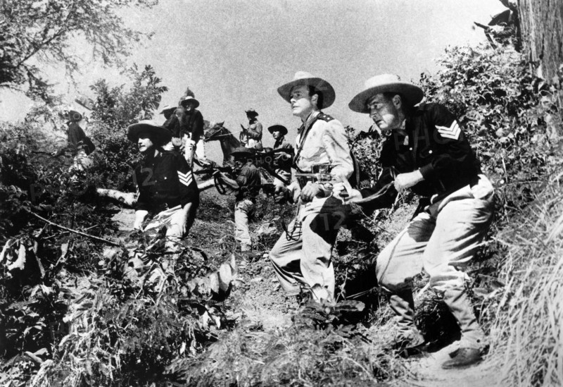 Myron Healey (2nd right), Richard Arlen (right), on-set of the film, "Cavalry Command", aka "The Day Of The Trumpet", People's Pictures, 1958