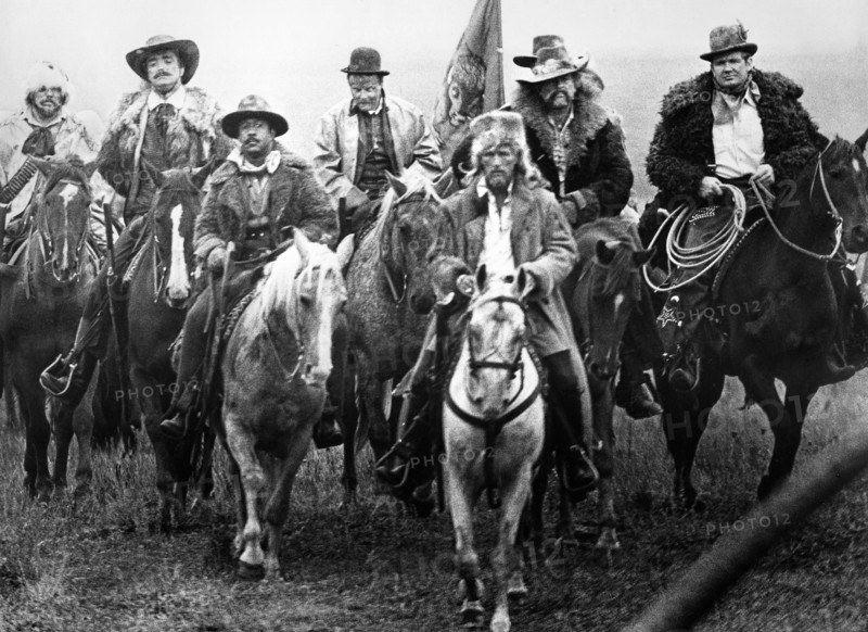 John Considine (2nd left), Robert DoQui (3rd left), Michael Kaplan (back, center), Paul Newman (front, center), on-set of the film, "Buffalo Bill And The Indians, Or Sitting Bull's History Lesson", United Artists, 1976