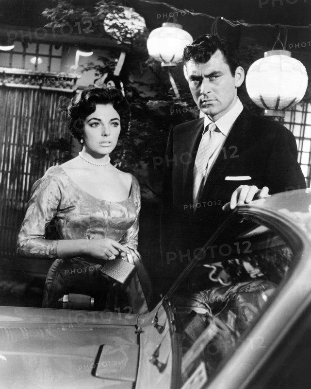 Joan Collins, Ken Scott, on-set of the film, "Stopover Tokyo", 20th Century-Fox, 1957