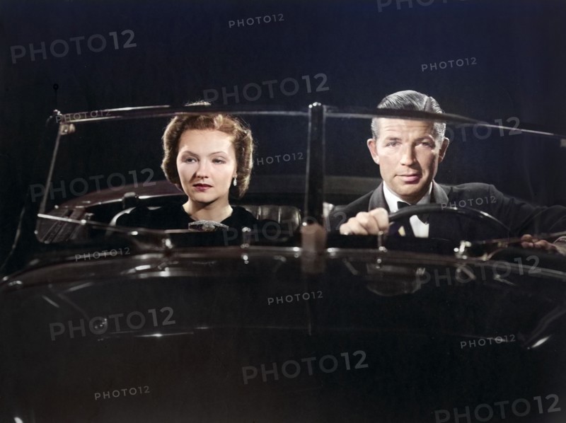 Beatrice Roberts, Bruce Cabot, on-set of the film, "Love Takes Flight", Grand National Films, 1937
