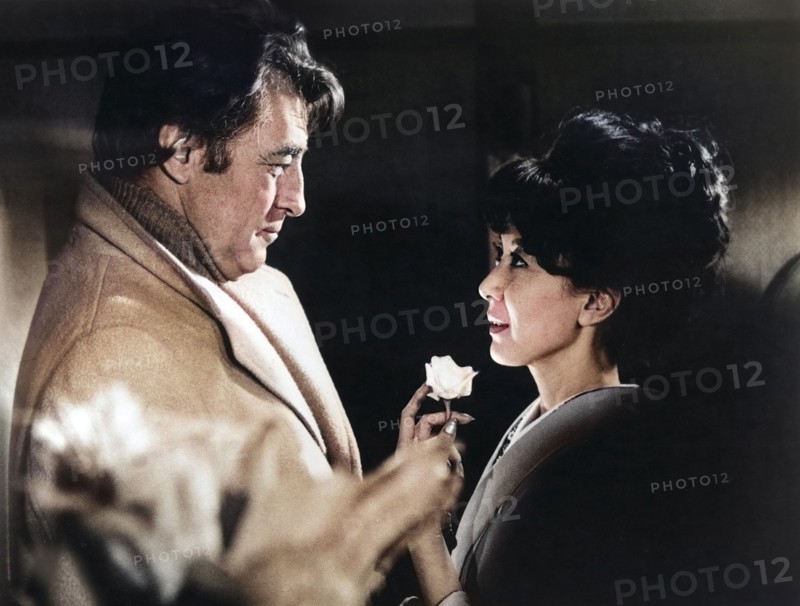 Robert Mitchum, Kishi Keiko, on-set of the film, " The Yakuza", Warner Bros., 1974