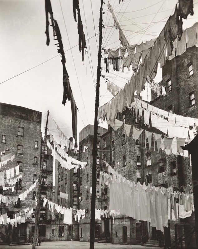 Courtyard of tenement buildings filled with lines of laundry, Yorkville, New York City, New York, USA, Berenice Abbott, Federal Art Project, "Changing New York", March 1936