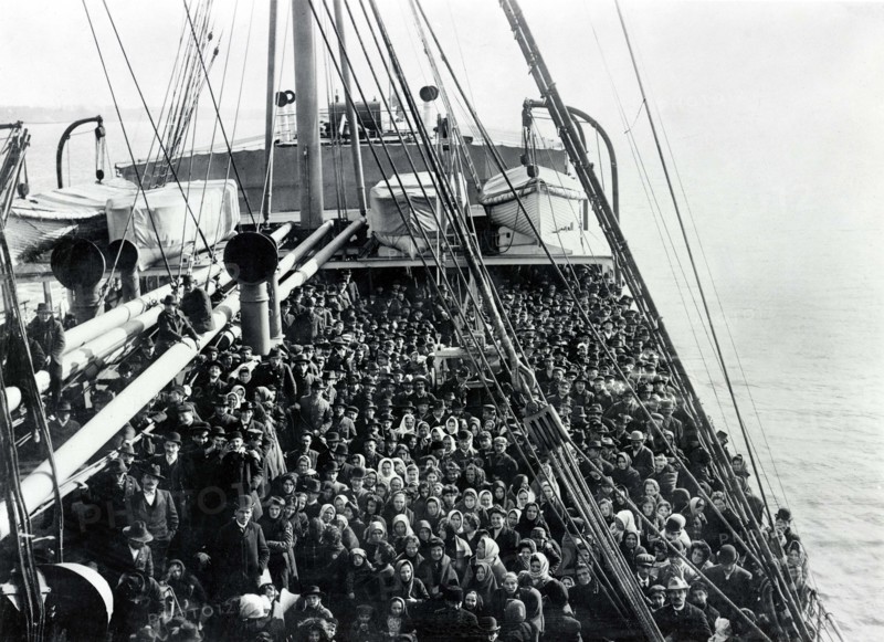 Crowd of men and women immigrants on deck of S.S. Patricia, Edwin Levick, December 1906