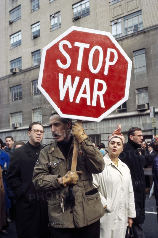 Man holding Stop War sign at anti-war rally, New York City, New York, USA, Bernard Gotfryd, 1969