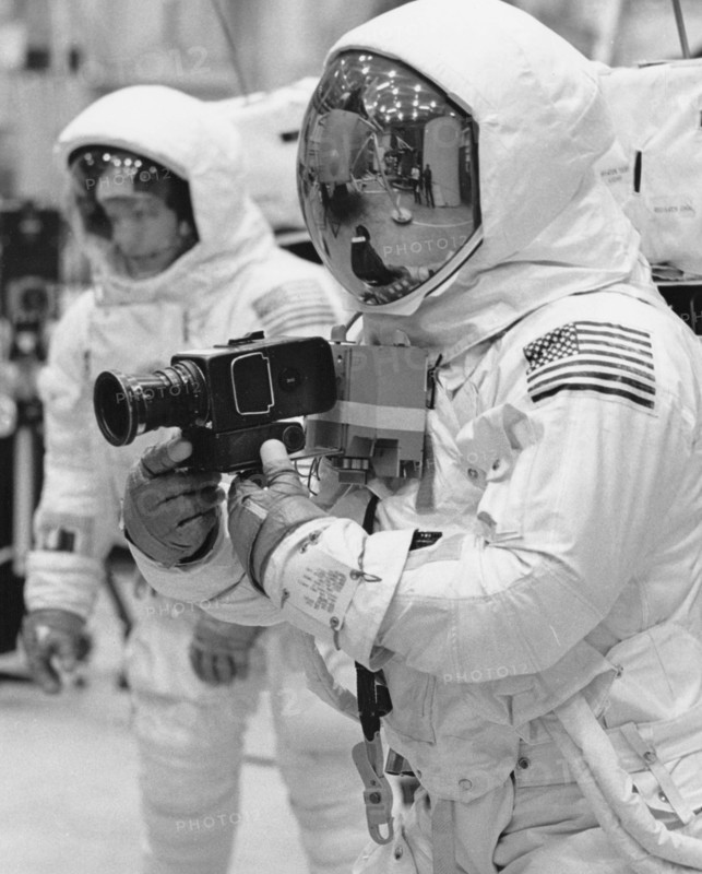 Apollo 11 Spacecraft Commander Neil Armstrong (front) and Lunar Module Pilot Edwin E. Aldrin (rear) practice lunar surface mobility in pressurized space suits, Manned Spacecraft Center, Houston, Texas, USA, NASA, April 1969