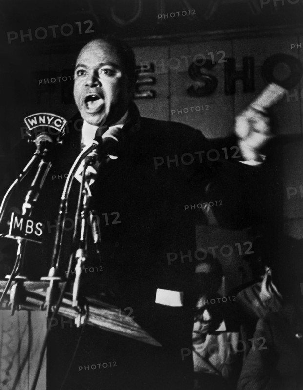 James Farmer, American civil rights activist, speaking before microphones outside Hotel Theresa, New York City, New York, USA, Stanley Wolfson, New York World-Telegram and the Sun Newspaper Photograph Collection, 1965