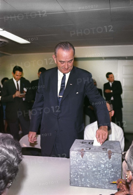 U.S. President Lyndon B. Johnson placing his vote in ballot box, Pedernales Electric Co-op Building, Johnson City, Texas, USA, Cecil Stoughton, November 3, 1964