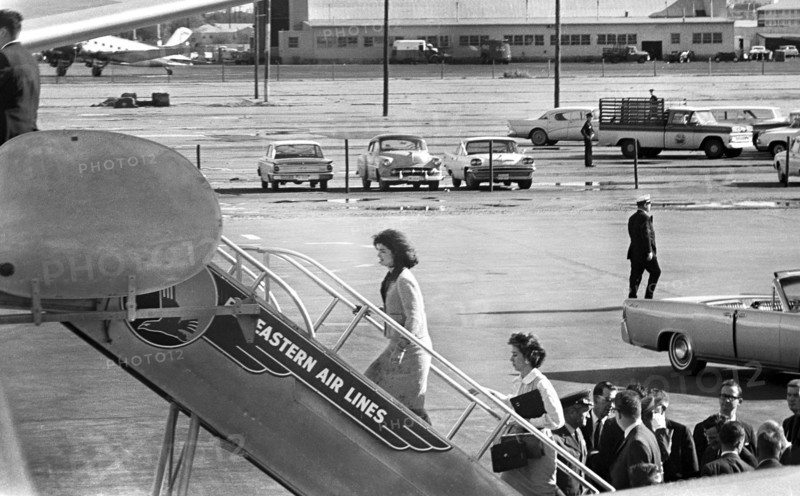 U.S. First Lady Jacqueline Kennedy and her secretary, Mary Gallagher, board Air Force One following transfer of late U.S. President John Kennedy’s casket to airplane, Love Field, Dallas, Texas, USA, Cecil Stoughton, White House Photographs, November 22, 1963