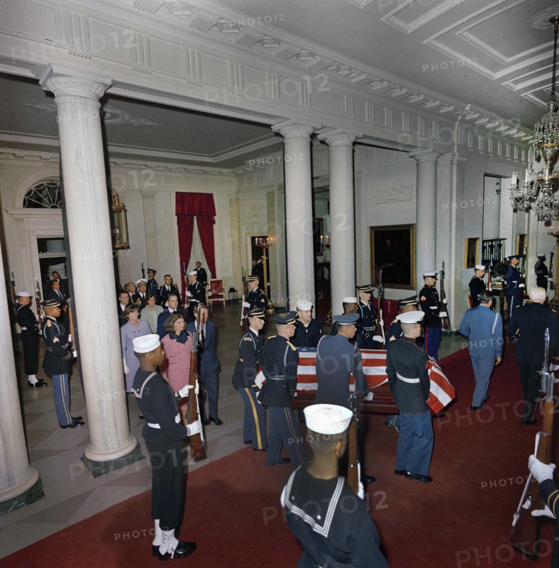 Arrival of late U.S. President John Kennedy’s casket, followed by Jacqueline Kennedy, Robert Kennedy, Jean Kennedy Smith, Ethel Kennedy, Robert McNamara, and others, White House, Washington, D.C., USA, Cecil Stoughton, White House Photographs, November 23, 1963