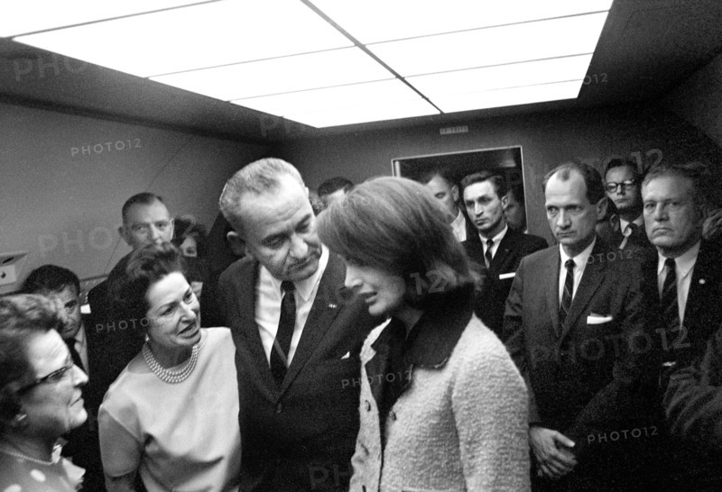 U.S. President Lyndon Johnson and First Lady Claudia "Lady Bird" Johnson consoling Jacqueline Kennedy after Johnson was sworn in as U.S. President by Judge Sarah Hughes aboard Air Force One after assassination of U.S. President John Kennedy, Jack Valenti, Albert Thomas, Lem Johns, Jack Brooks, Bill Moyers in background, Love Field Airport, Dallas, Texas, USA, Cecil W. Stoughton, November 22, 1963