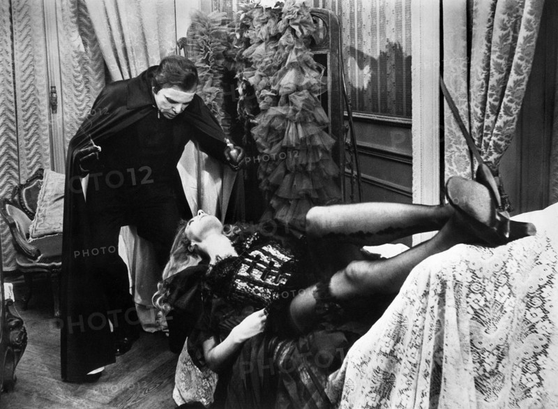 Herbert Lom, Maria Perschy on-set of the film, "Murders In The Rue Morgue", American International Pictures, 1971