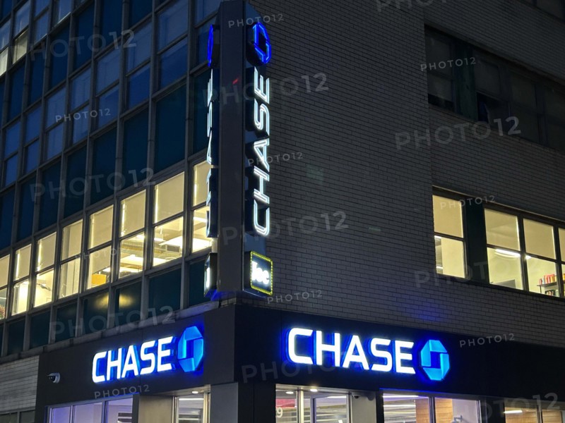 Chase retail bank office, building exterior at night, New York City, New York, USA
