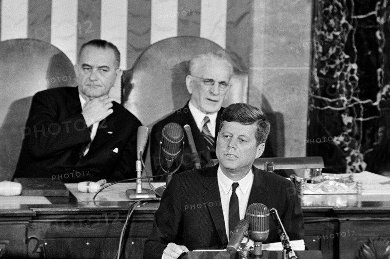 U.S. President John Kennedy delivering his annual State of the Union address to the Congress with U.S. Vice President Lyndon B. Johnson and Speaker of the House of Representatives John W. McCormack in background, House of Representatives Chamber, United States Capitol Building, Washington, D.C., USA, Cecil Stoughton, White House Photographs, January 11, 1962