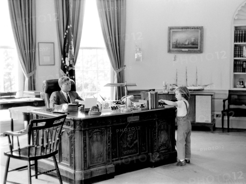 U.S. President John F. Kennedy and his daughter Caroline in Oval Office, White House, Washington, D.C., USA, Robert Knudsen, White House Photographs, May 16, 1962