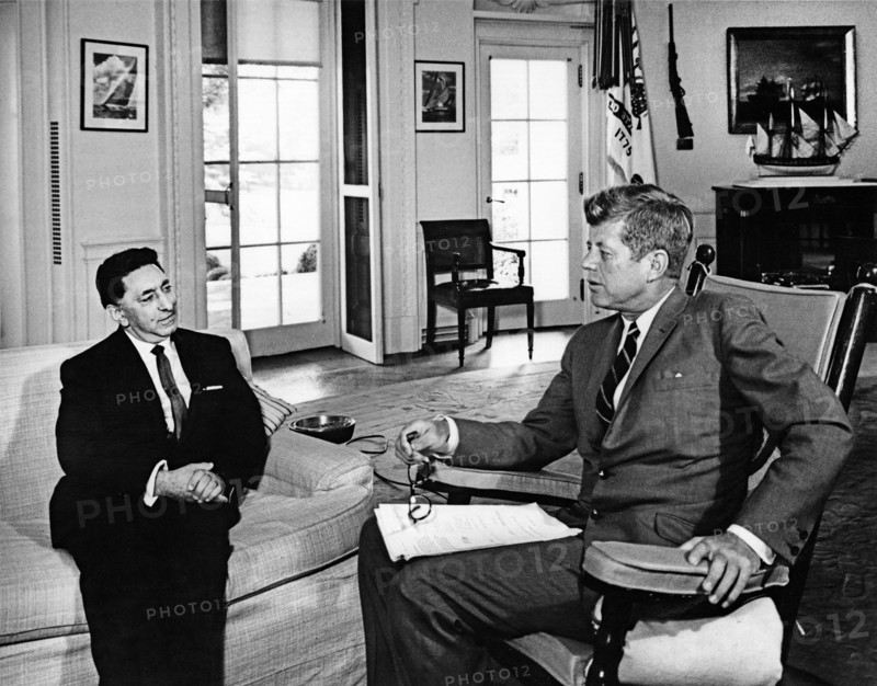 U.S. President John F. Kennedy (in rocking chair) meeting with newly-appointed Ambassador of Afghanistan, Dr. Abdul Majid, Oval Office, White House, Washington, D.C., USA, Robert Knudsen, White House Photographs, August 21, 1963