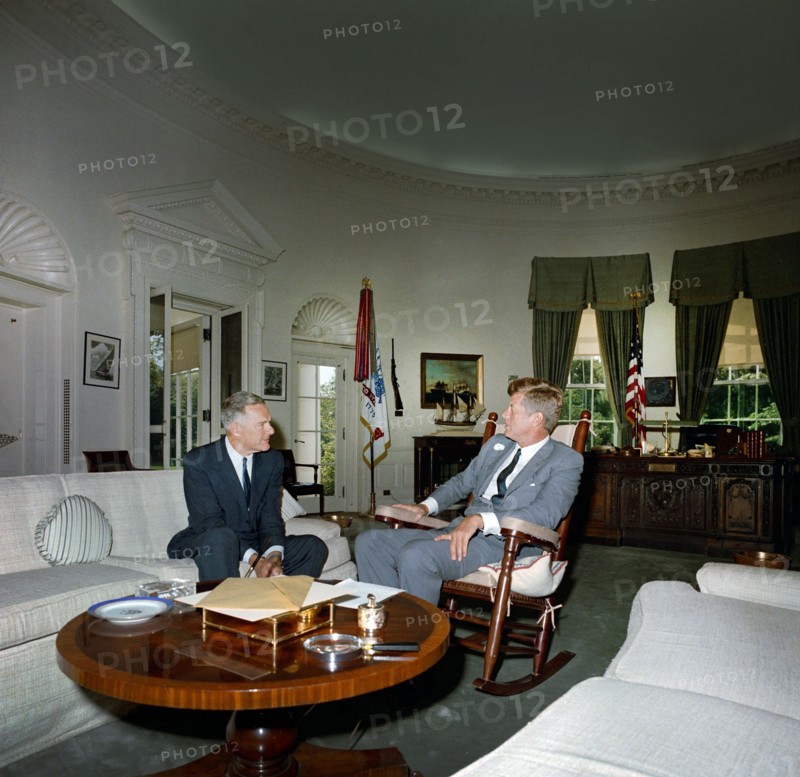 U.S. President John F. Kennedy (in rocking chair) meeting with newly-appointed U.S. Ambassador to South Vietnam, Henry Cabot Lodge, Oval Office, White House, Washington, D.C., USA, Robert Knudsen, White House Photographs, August 15, 1963