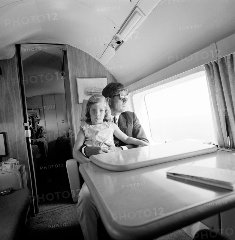 U.S. President John F. Kennedy and his daughter, Caroline Kennedy, sitting aboard Marine One enroute from Hyannis Port to Otis Air Force Base, Cape Cod, Massachusetts, USA, Cecil Stoughton, White House Photographs, Augus 12, 1963