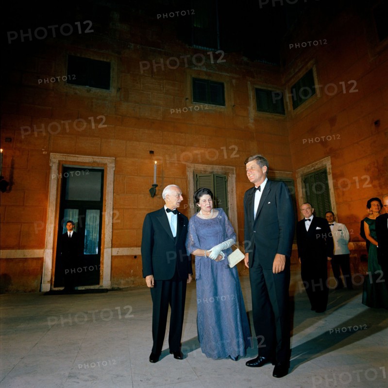 U.S. President John F. Kennedy standing with President of Italy, Antonio Segni (left), and wife, Laura Segni at dinner given in his honor, Quirinale Palace, Rome, Italy, Cecil Stoughton, White House Photographs, July 1, 1963