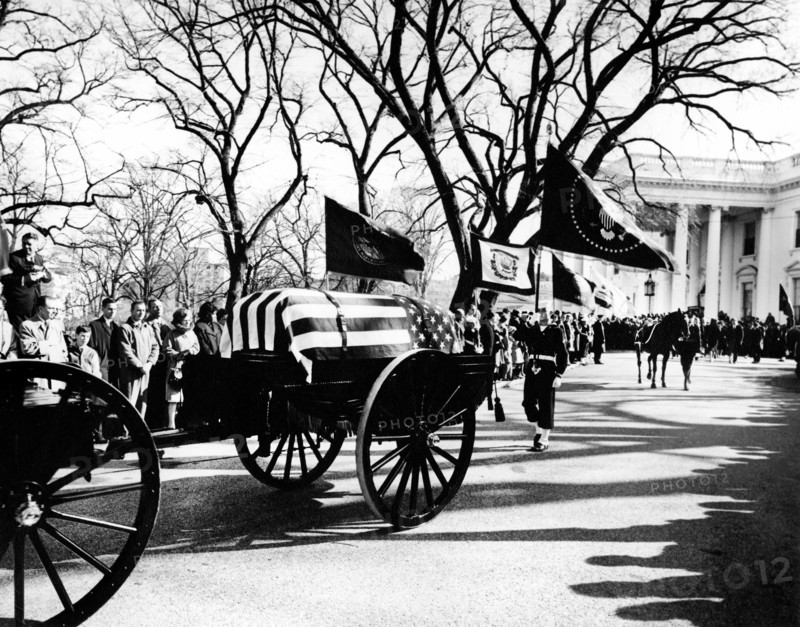 Funeral procession with flag-draped casket of U.S. President John F. Kennedy departing the White House for the Cathedral of St. Matthew the Apostle, Washington, D.C., USA, Abbie Rowe, White House Photographs, November 25, 1963