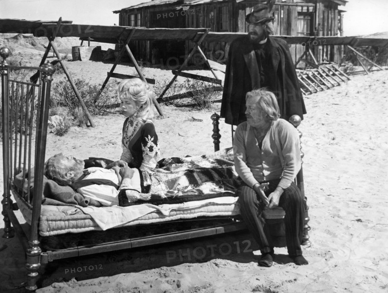 Jason Robards, Stella Stevens, David Warner, Strother Martin (seated), on-set of the western film, "The Battle Of Cable Hogue", Warner Bros., 1970