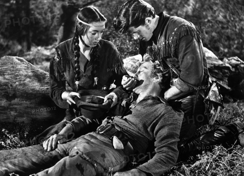 Elizabeth Threatt (left), Kirk Douglas (center), Dewey Martin (right), on-set of the western film, "The Big Sky", RKO Radio Pictures, 1952