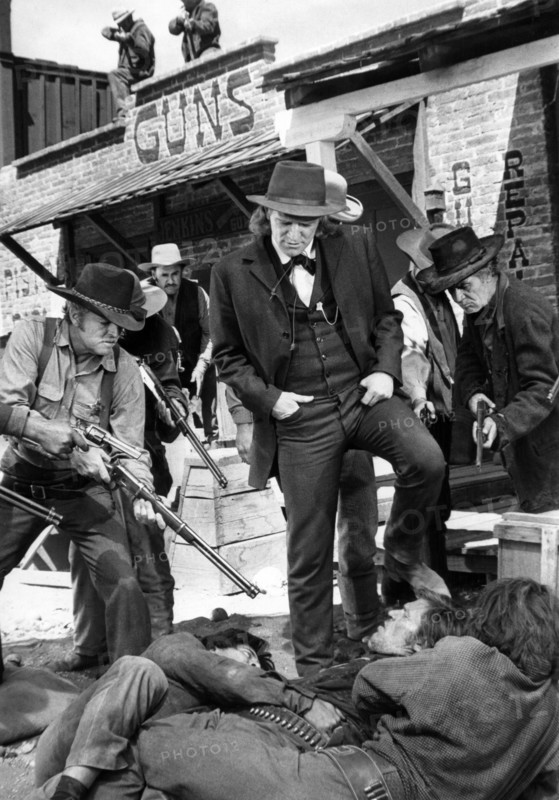 Richard Harris (standing center), on-set of the western film, "The Deadly Trackers", Warner Bros., 1973