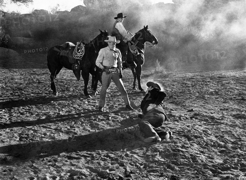 Jack Holt (standing),on-set of the western film, "The Gallant Legion, Republic Pictures, 1948