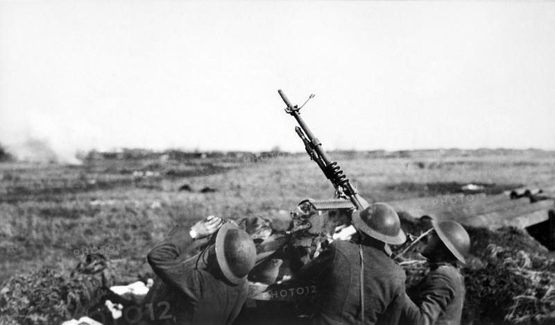 Anti-aircraft machine gun of 101st Field Artillery (formerly 1st Massachusetts Field Artillery, New England Coast Artillery), firing on a German observation plane, Plateau Chemin des Dames, France, U.S. Army Signal Corps, March 1918