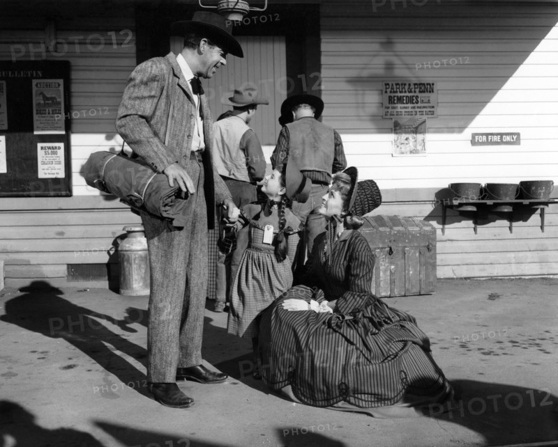 Fred MacMurray, Gina Gillespie, Dorothy Green, on-set of the western film, "Face Of A Fugitive", Columbia Pictures, 1959