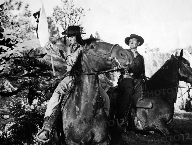 Macdonald Carey, Wendell Corey, on-set of the western film, "The Great Missouri Raid", Paramount Pictures, 1951