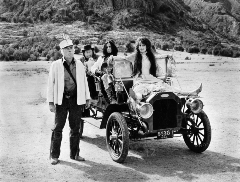 Lee Marvin, Strother Martin, Oliver Reed, Elizabeth Ashley, on-set of the western film, "The Great Scout And Cathouse Thursday", United Artists, 1976