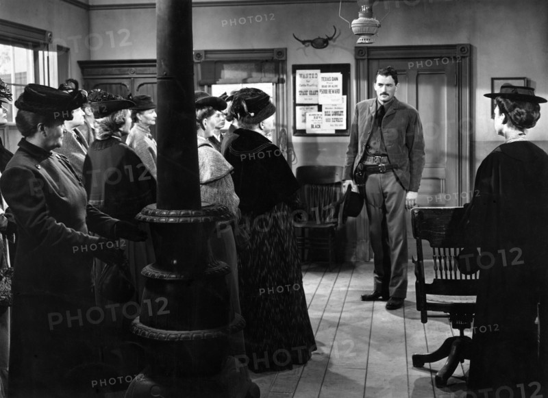 Gregory Peck, on-set of the western film, "The Gunfighter", 20th Century-Fox, 1950