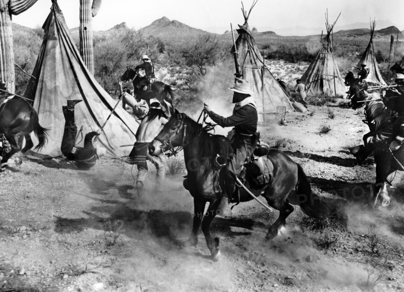 U.S. Cavalry attacking Apache village, on-set of the western film, "The Guns Of Fort Petticoat", Columbia Pictures, 1957