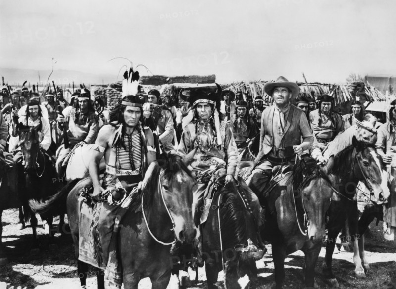 Ray Teal (on horse, right), on-set of the western film, "The Guns Of Fort Petticoat", Columbia Pictures, 1957