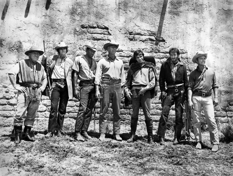 James Whitmore, Joe Don Baker, Bernie Casey, George Kennedy, Reni Santoni, Scott Thomas, Monte Markham, on-set of the western film, "Guns Of The Magnificent Seven", United Artists, 1969