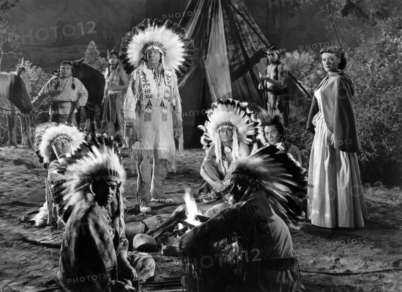Ellen Drew (far right), on-set of the western film, "Davey Crockett, Indian Scout", United Artists, 1950