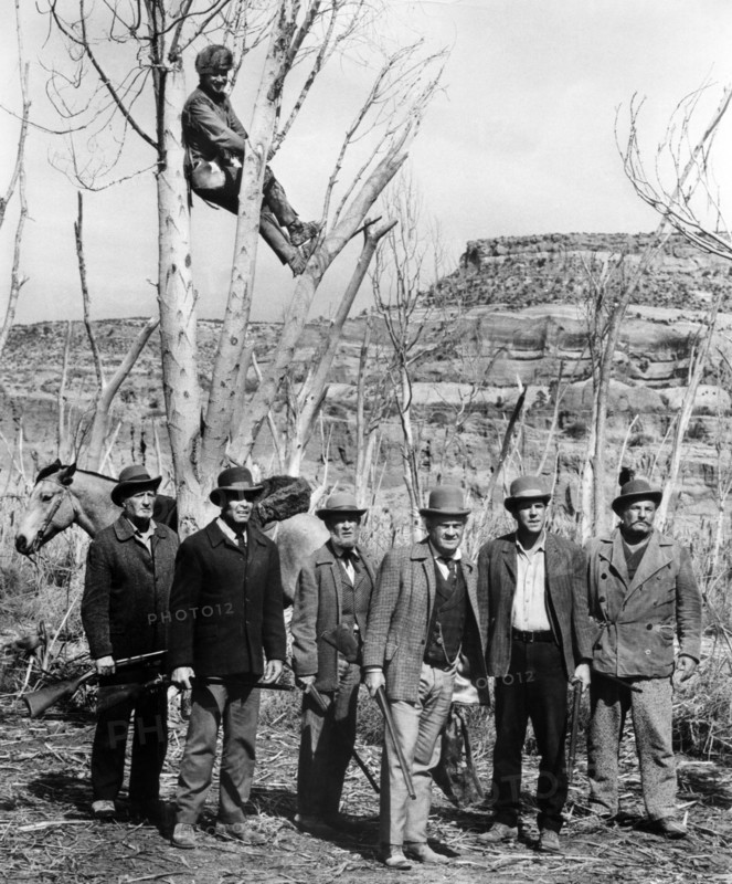 Donald Pleasence (sitting in tree), Dub Taylor (third from right), on-set of the western film, "The Hallelujah Trail", United Artists, 1965