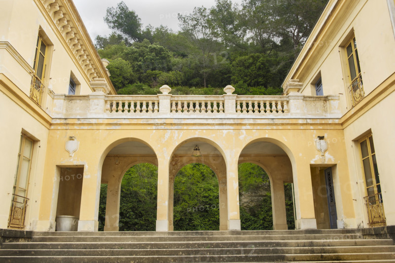 Arched walkway connecting two buildings, Nice, France