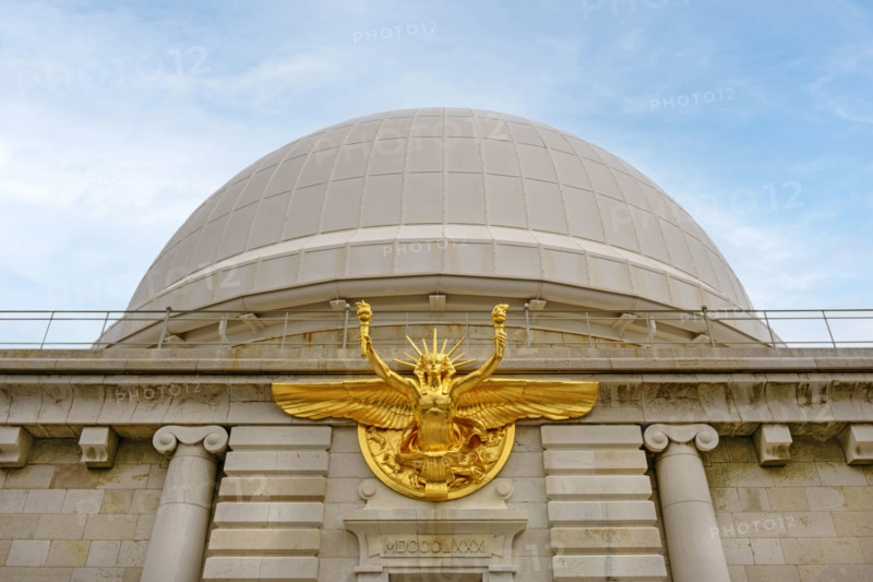 Low angle view of main entrance with bronze statue of Greek God Apollo and dome, Nice Observatory, Nice, France