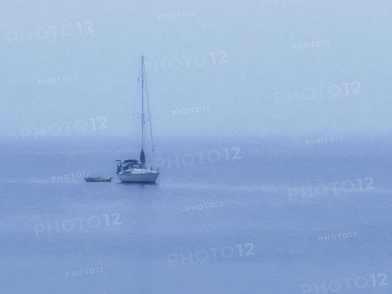 Two boats moored at sea