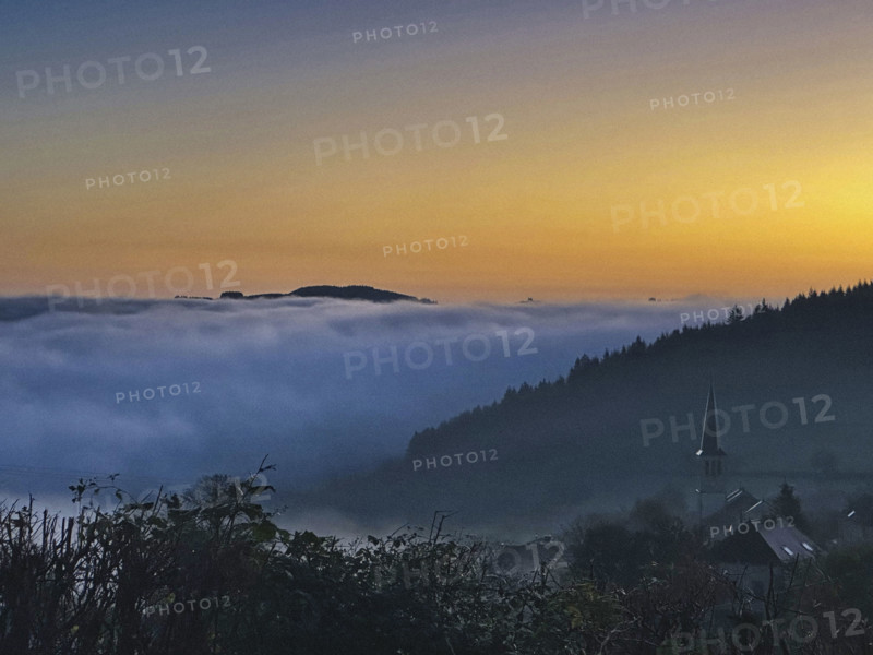 Clouds covering scenic landscape at sunrise, Burgundy, France
