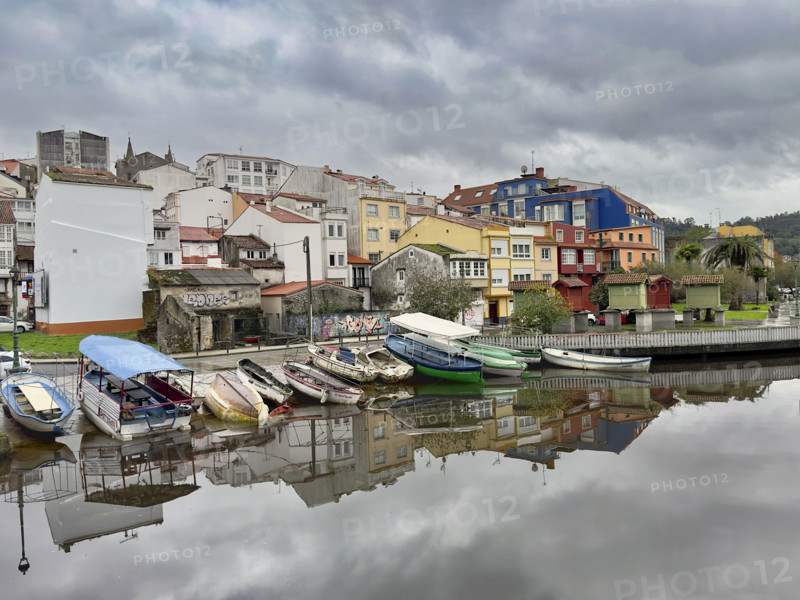 Boats on shore of Rio Madeo, Betanzos, Galicia, Spain