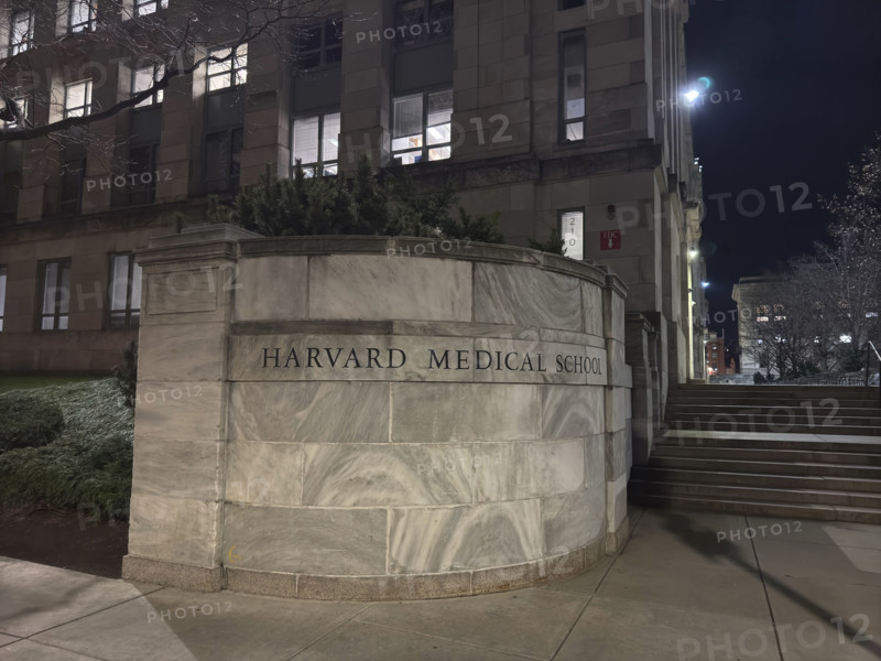 Harvard Medical School, Etched sign in curved wall and building exterior, Boston, Massachusetts, USA